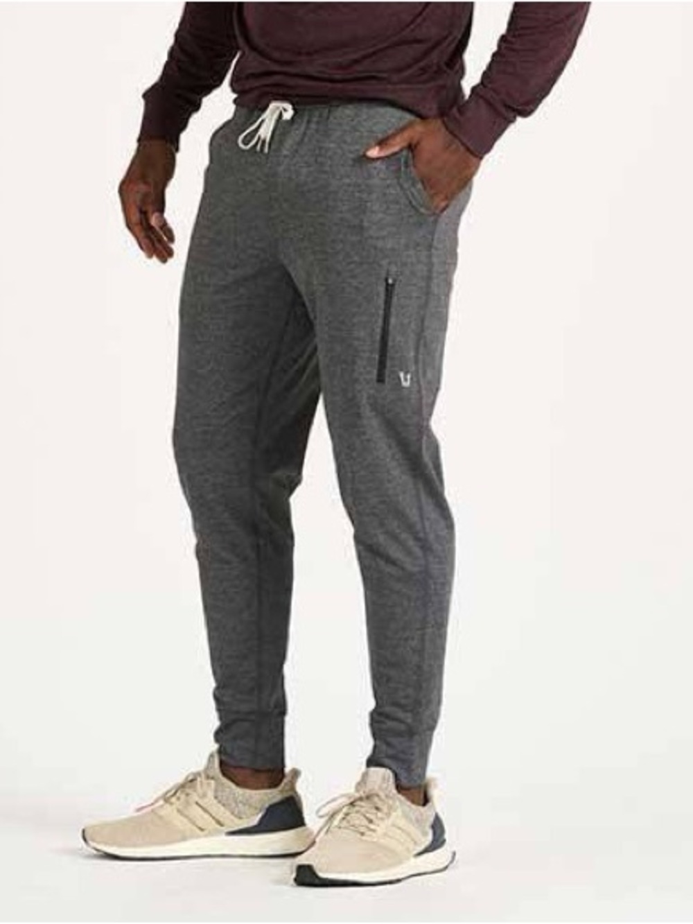 Vuori Men's Sunday Performance Jogger in the Charcoal Heather colorway.